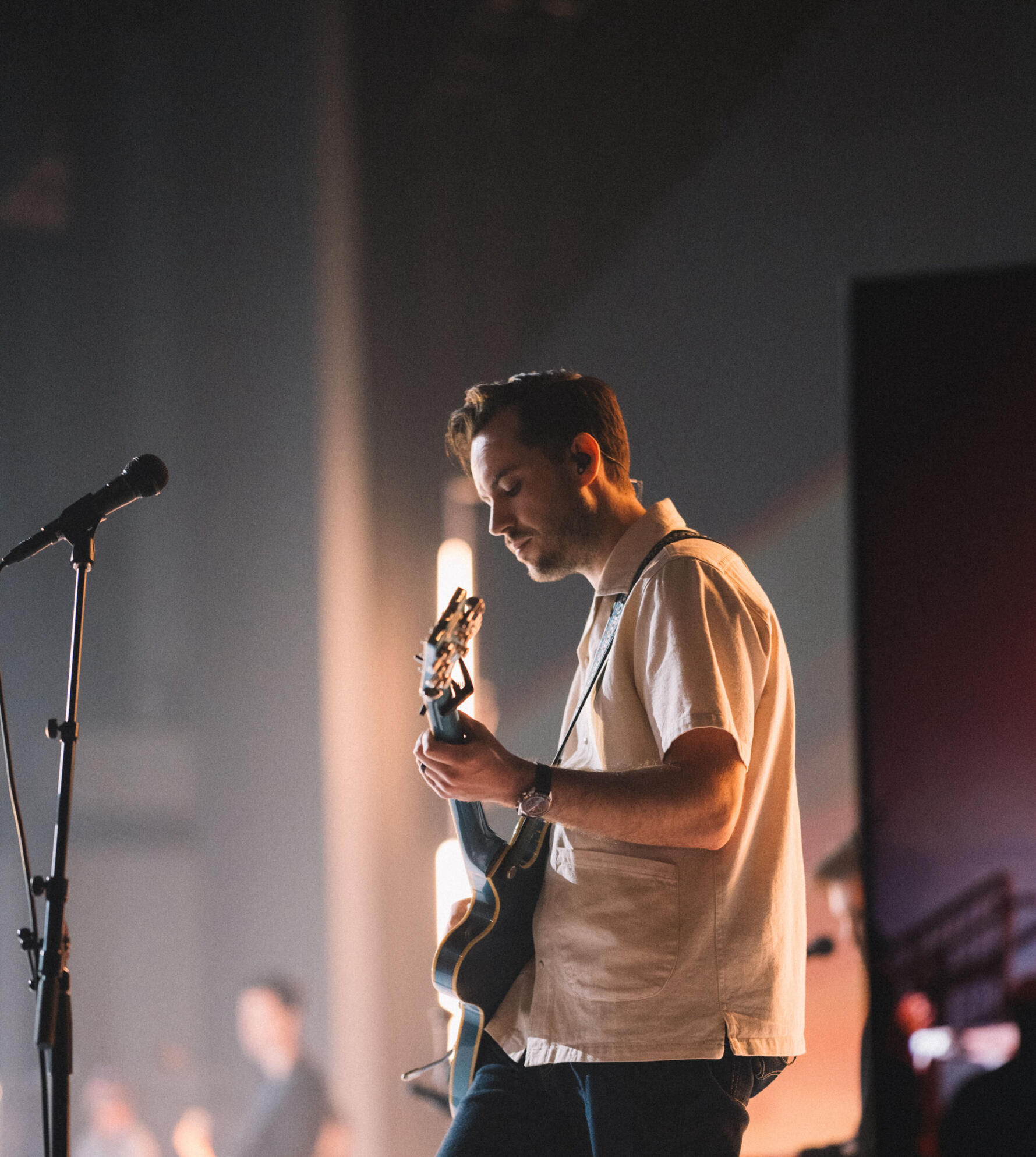 A man playing a guitar
