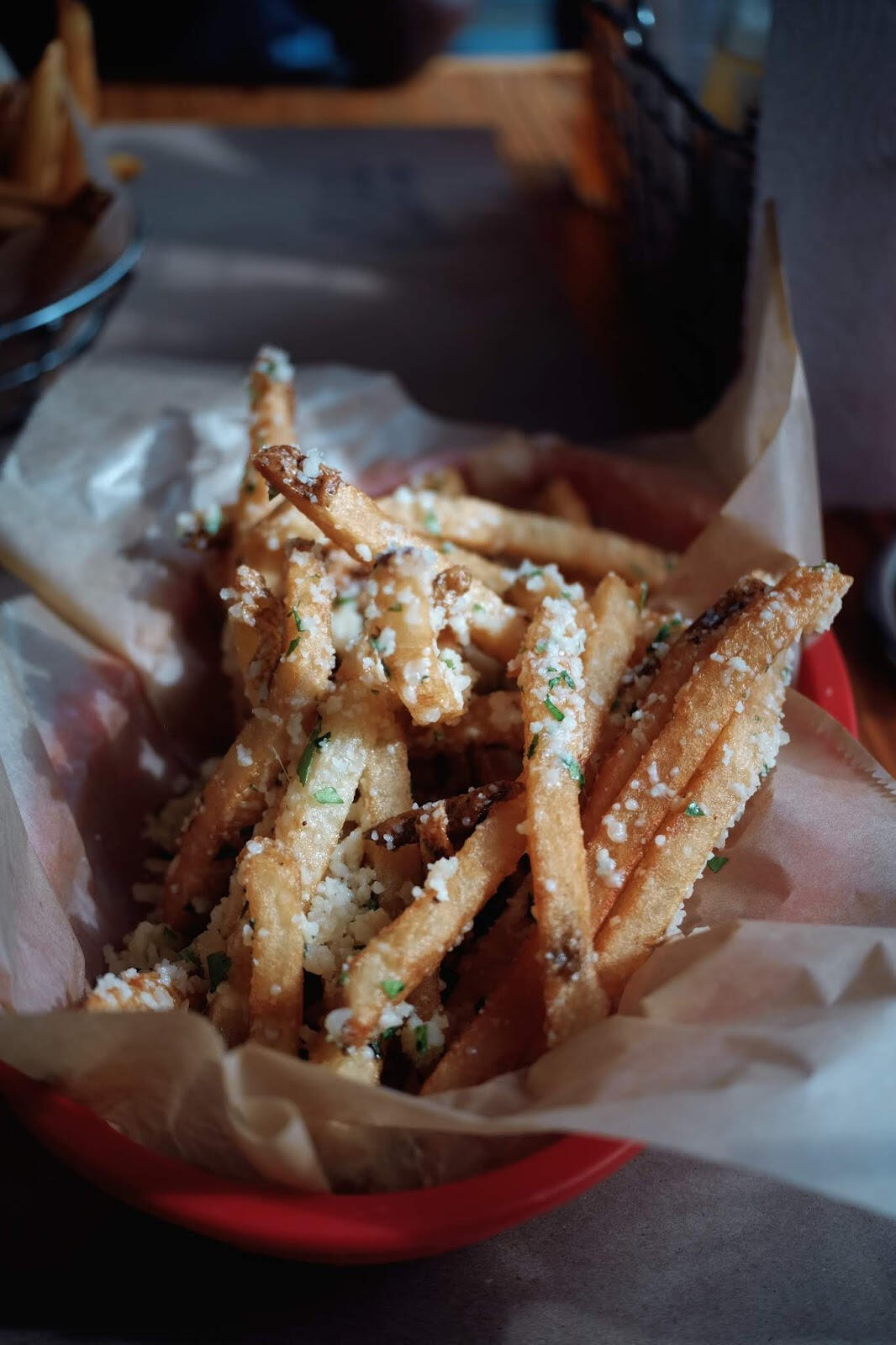 parmesan truffle fries in a basket